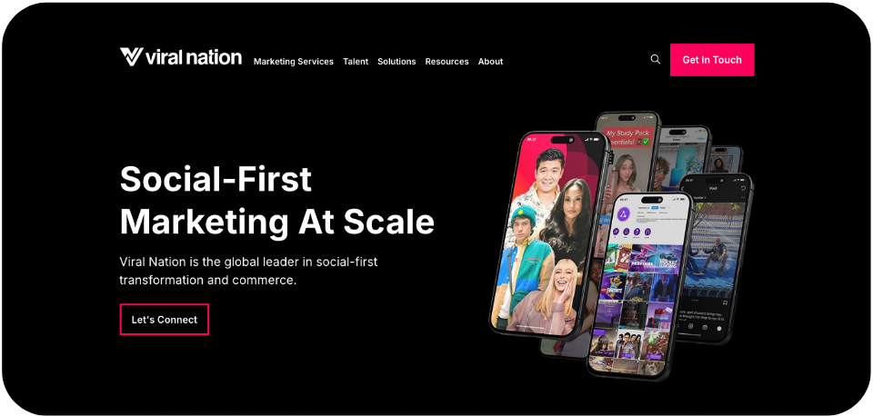 Viral Nation Agency website homepage showcasing its social media marketing services with the tagline 'A creative-first social agency’
featuring a mobile phones displaying vibrant social media ad visuals against a black background.