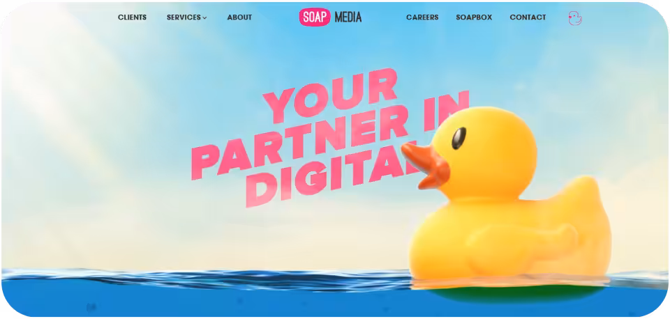 SOAP Media website homepage featuring the tagline 'Your Partner in Digital' with a large rubber duck floating on water, representing the agency's creative approach to digital marketing.