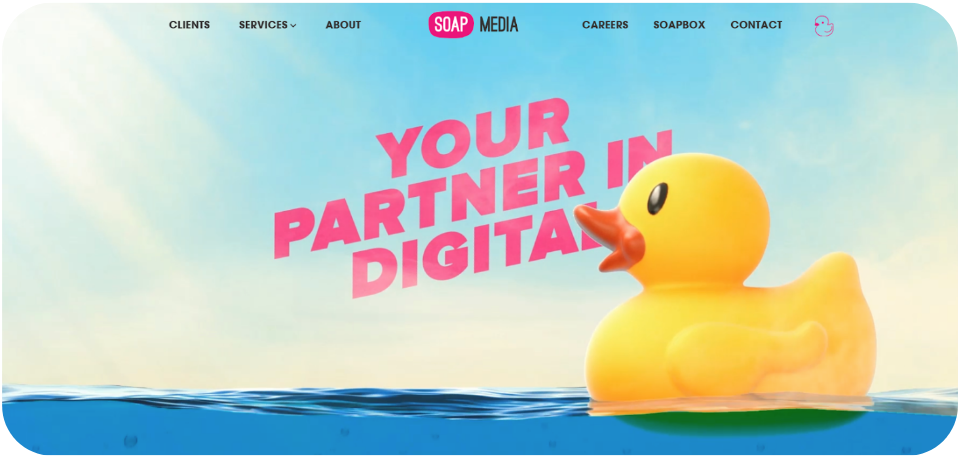 SOAP Media website homepage featuring the tagline 'Your Partner in Digital' with a large rubber duck floating on water, representing the agency's creative approach to digital marketing.